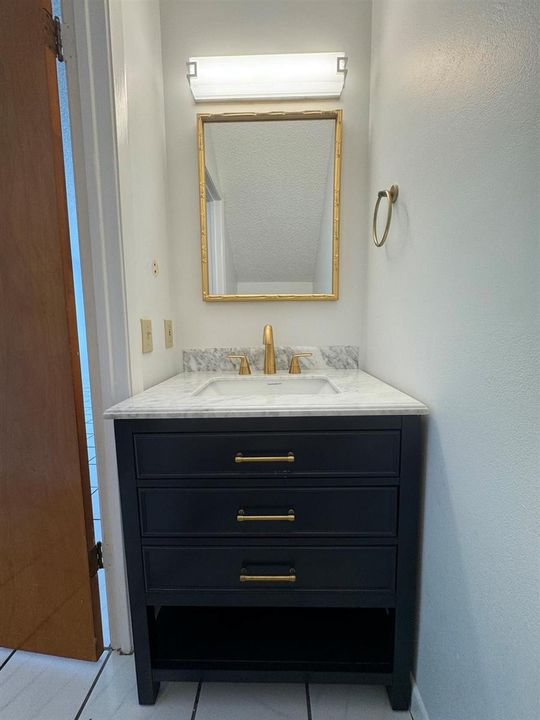 Downstairs half bath.