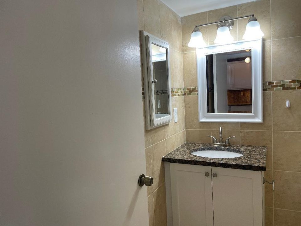 WITH TILE FLOOR TO CEILING