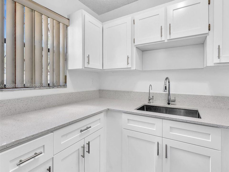 Remodeled kitchen cabinets and counters