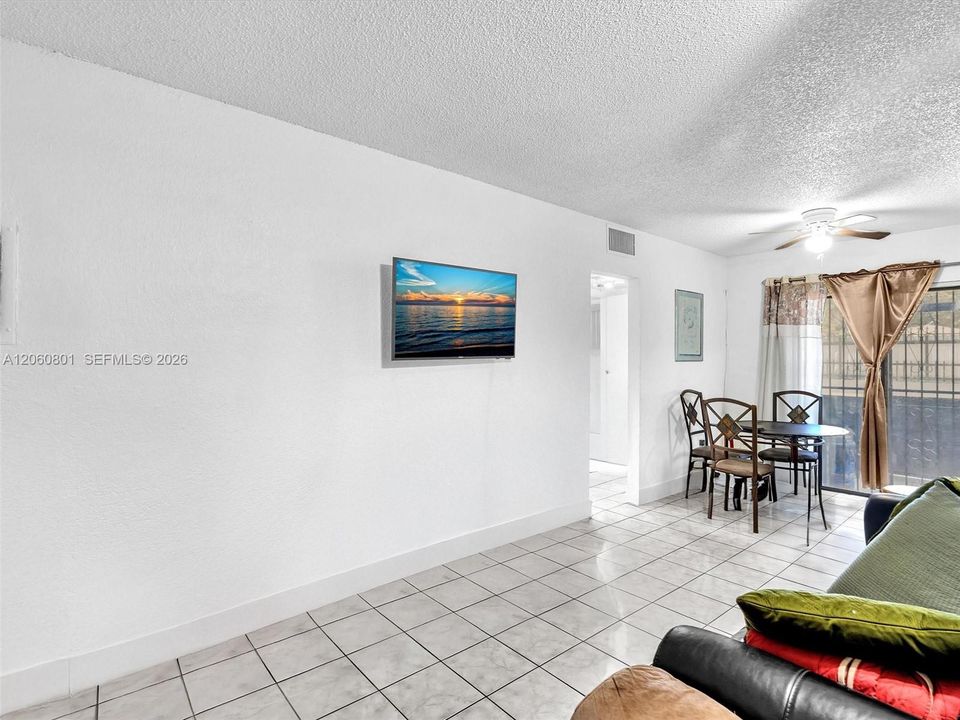 Bright living room with tile flooring