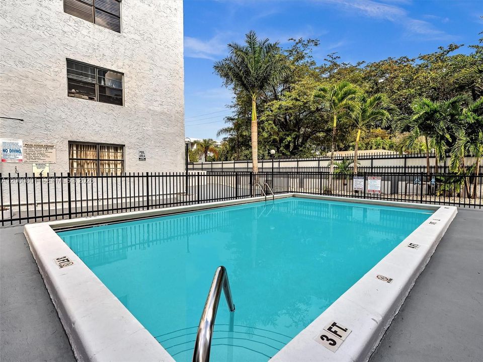 Sunny pool deck and lounge area