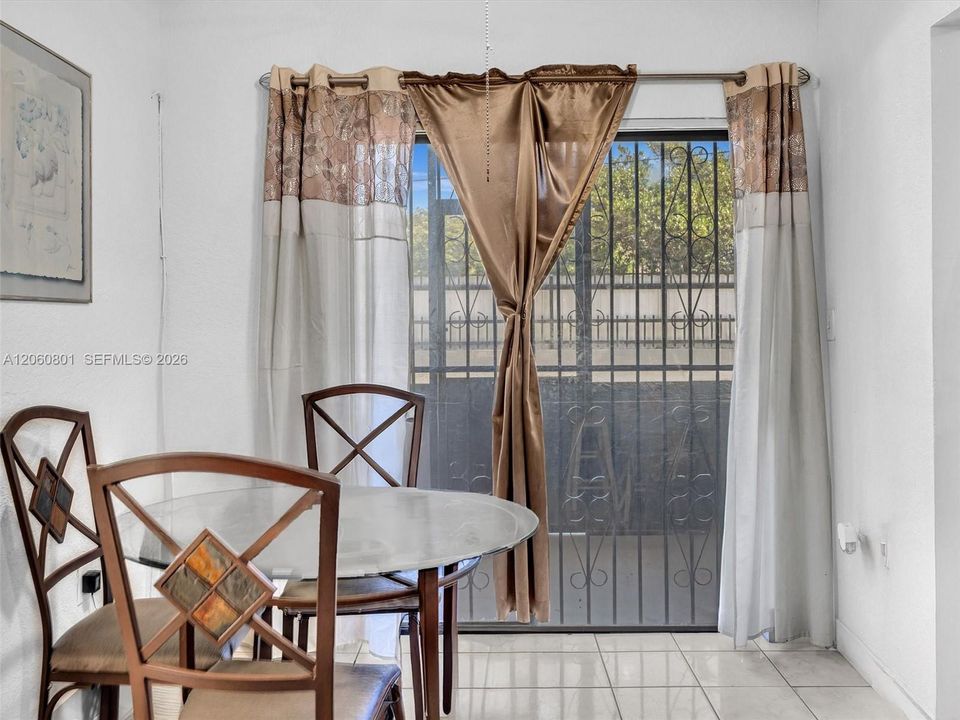 Dining area overlooking screened patio