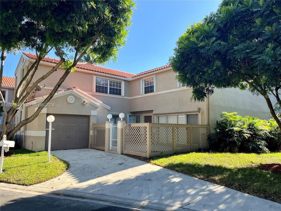 End unit with grassy area and close to guest parking