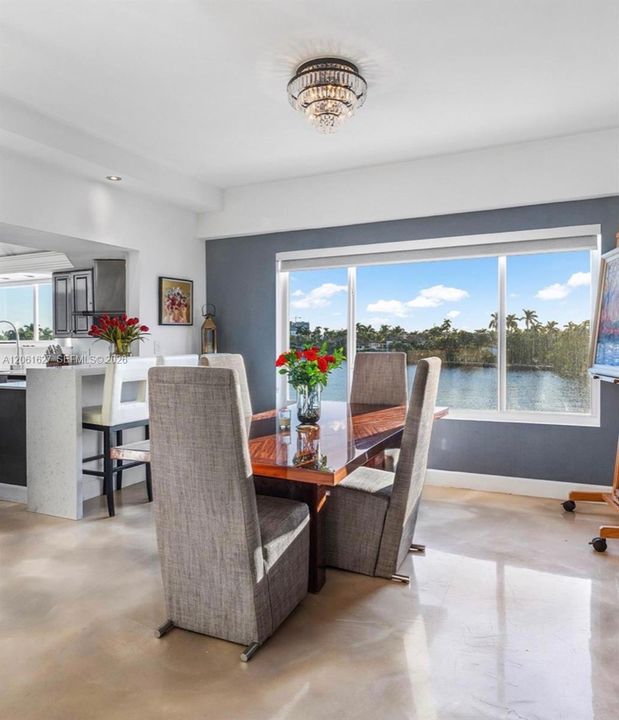 Dining Area Off Kitchen and Living Room with Coffee Bar.