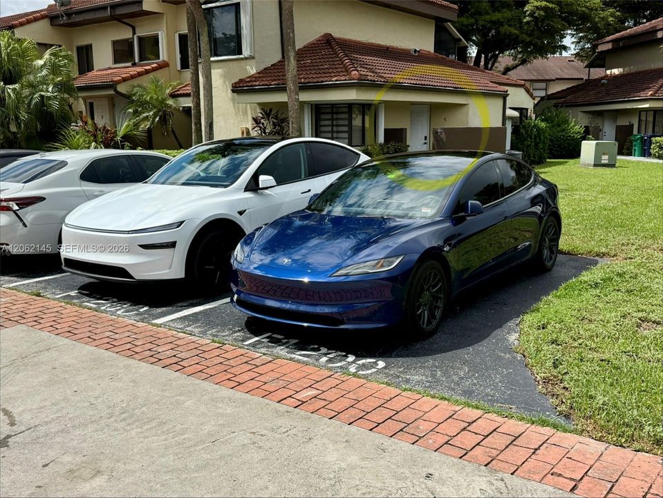Two Dedicated Parking Spots In Front of Unit (Third allotment in guest)