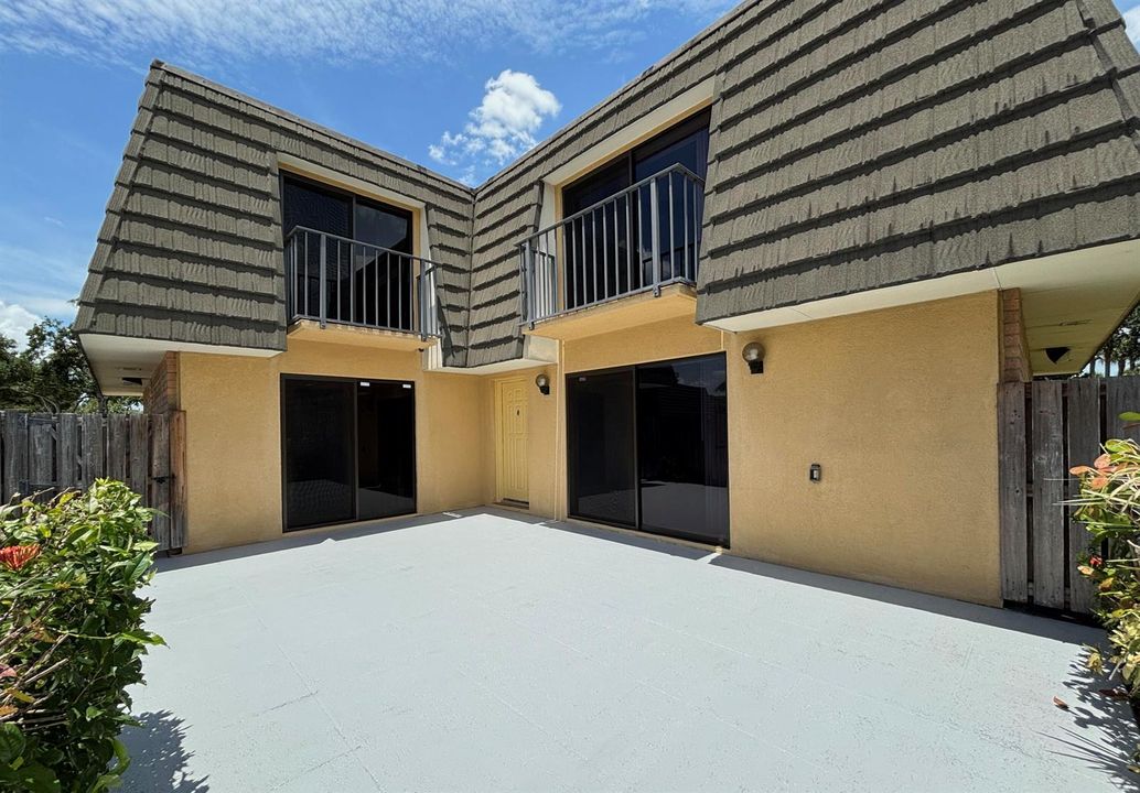 Large Patio w/onlooking balconies