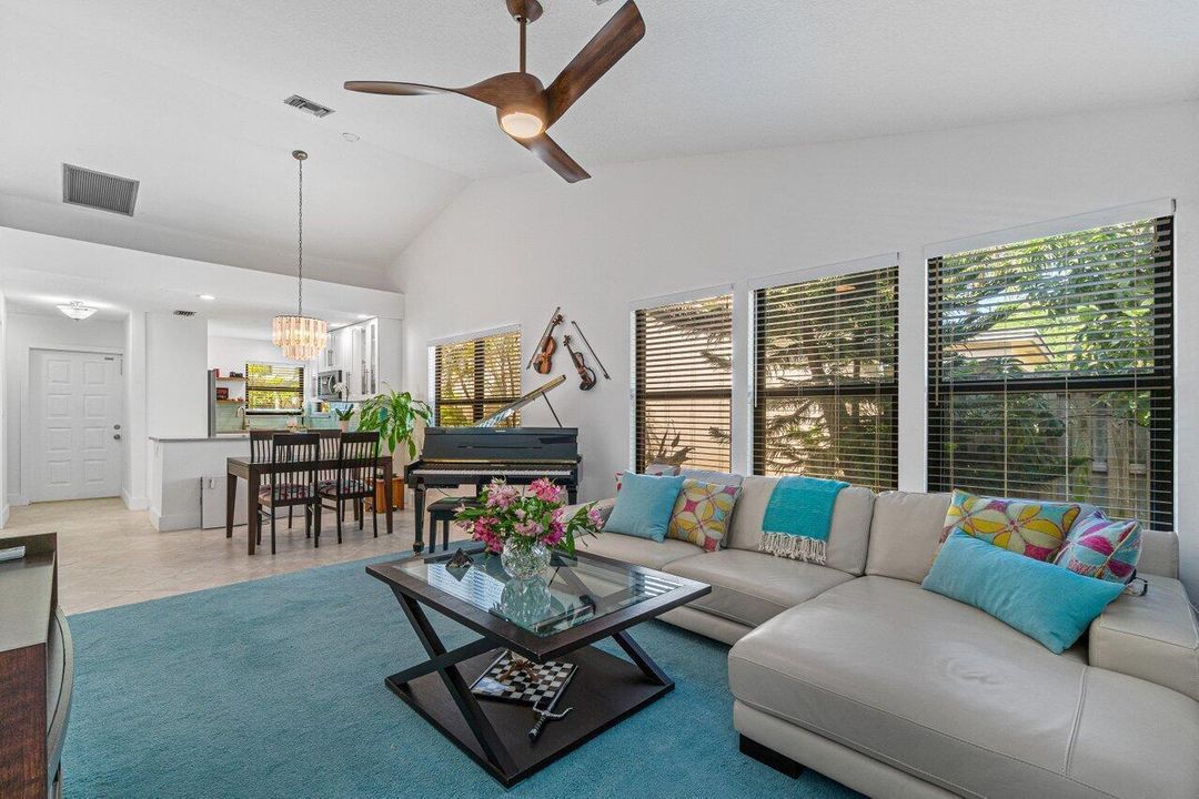 LIVING ROOM WITH VAULTED CEILINGS