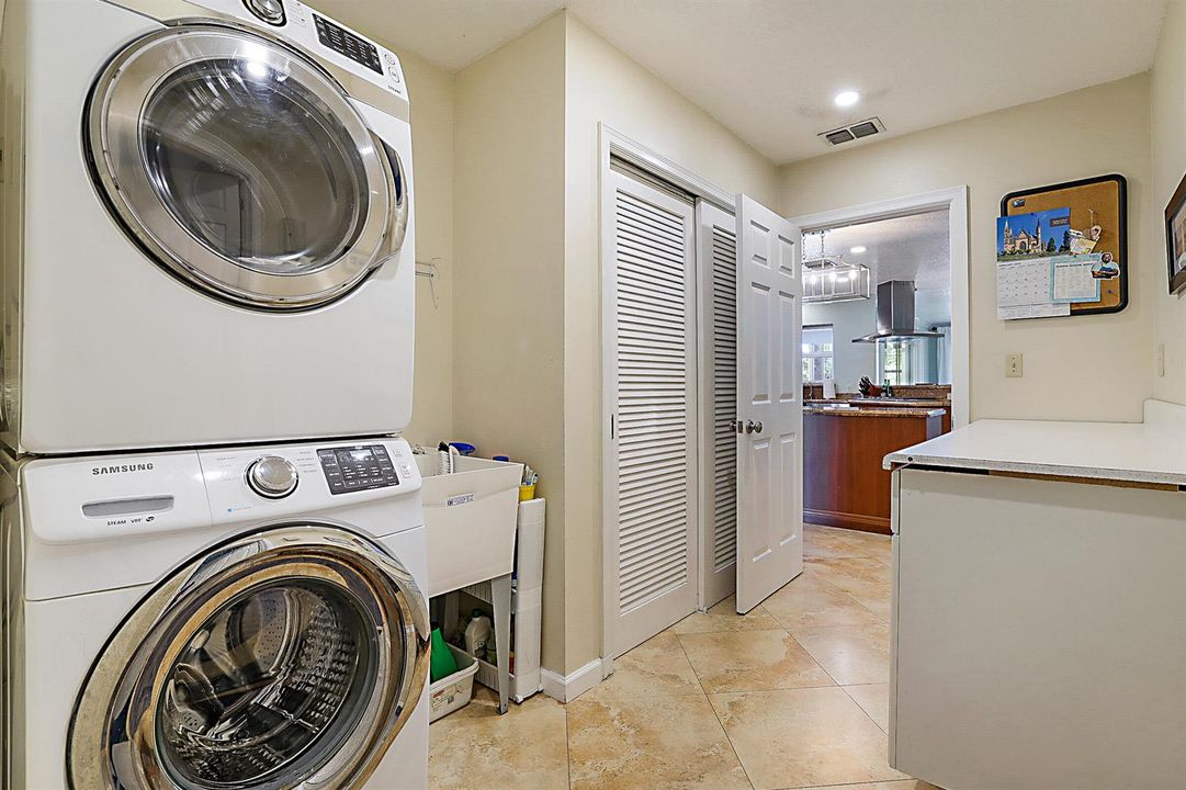 Laundry w/stacked Washer/Dryer