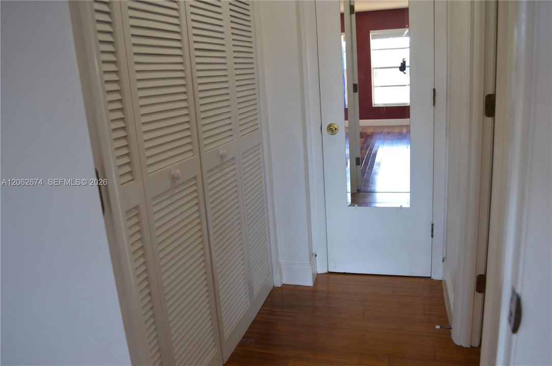 Hall in bedroom with 2 closets