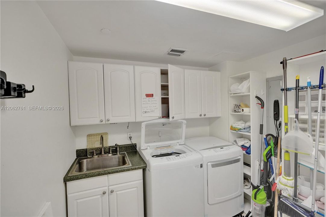 There is a full bathroom in the laundry.