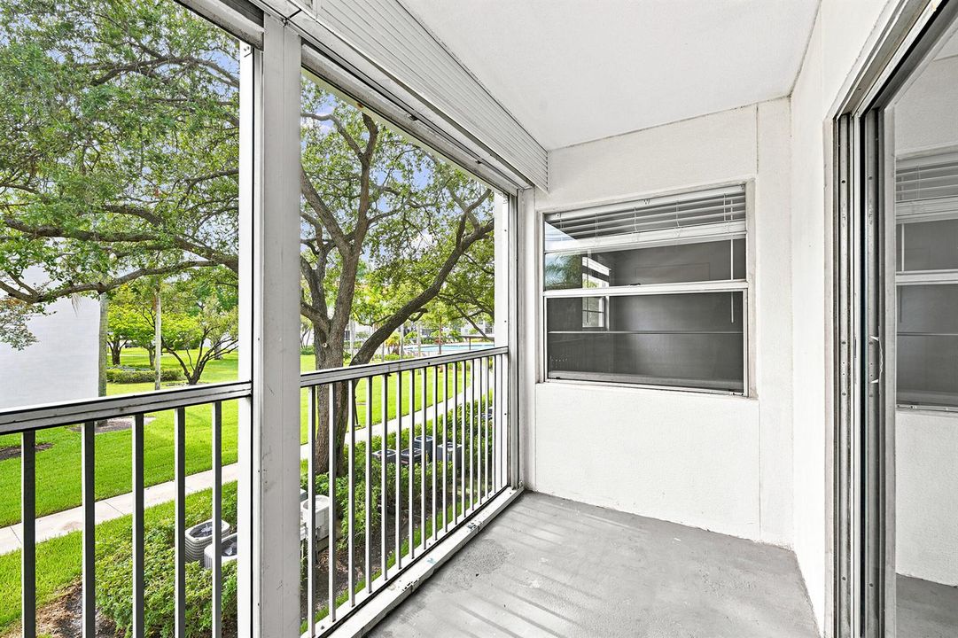 Screened Balcony with Pool Views