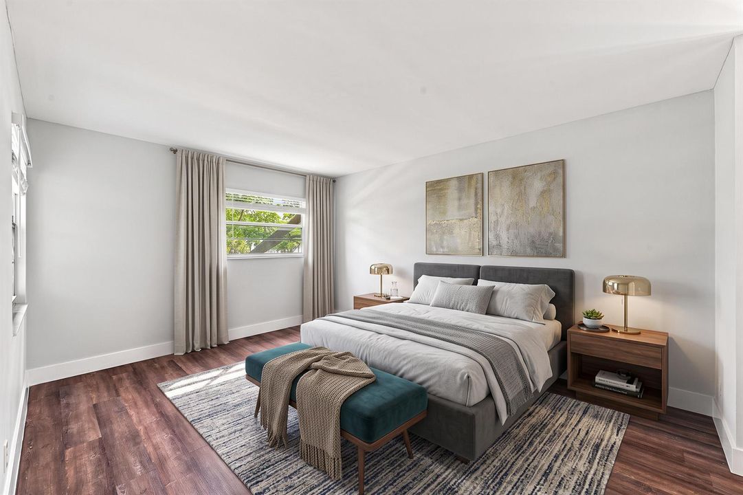 Primary Bedroom (Staged) w/Pool Views