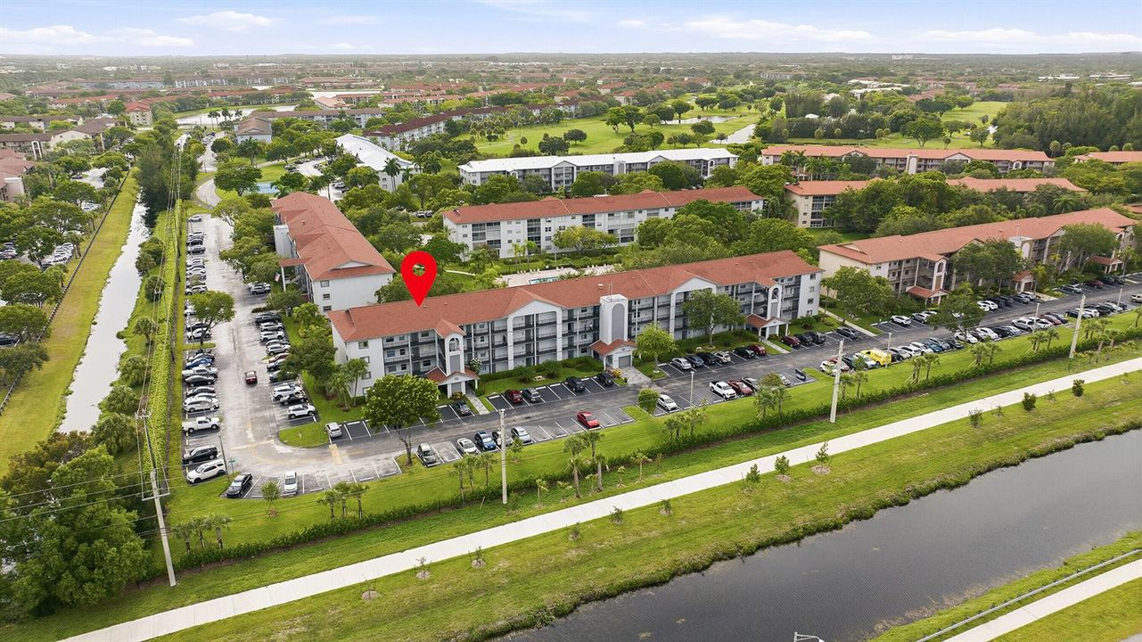 Aerial & Water View of Building & Pool
