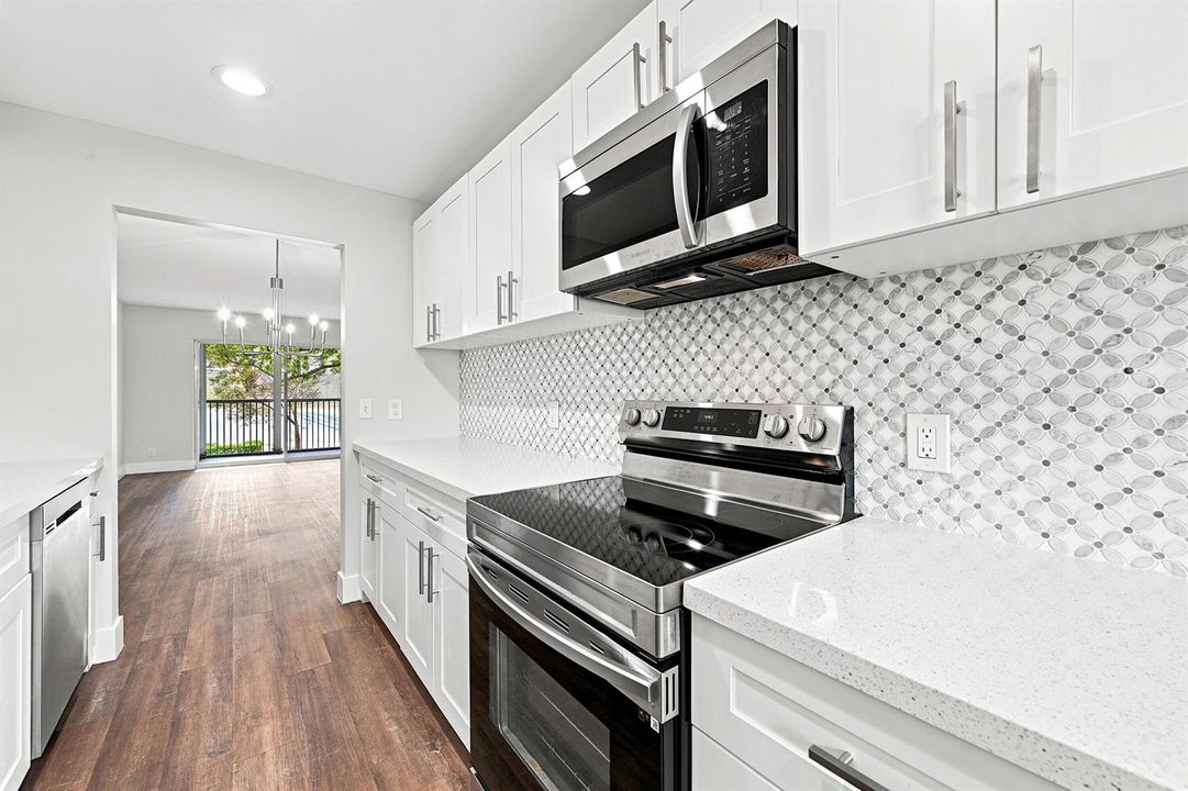 Kitchen, Dining & Living Rooms