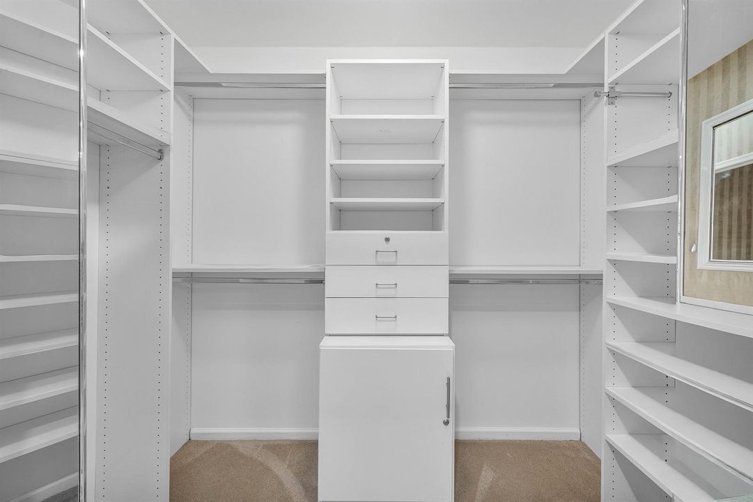 CUSTOM BUILT PRIMARY CLOSET