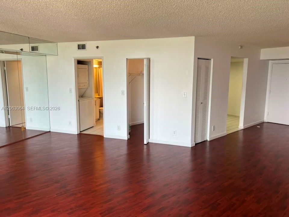 kitchen door on the right, 2nd bathroom door on left and extra closet next to it