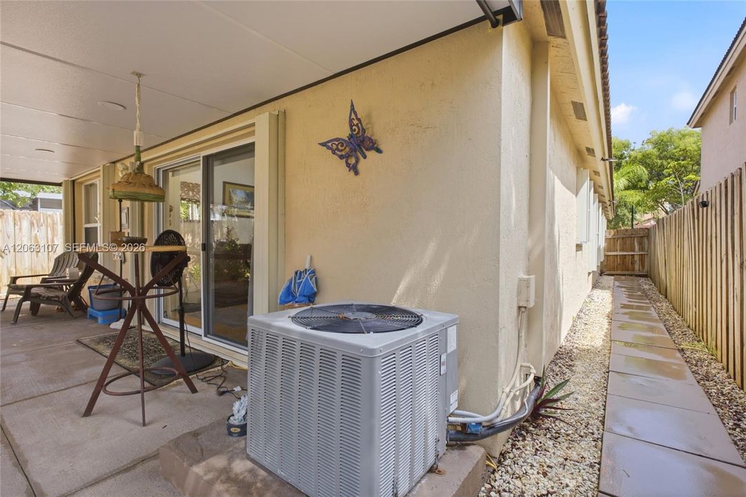back and right side with  hurricane shutters
