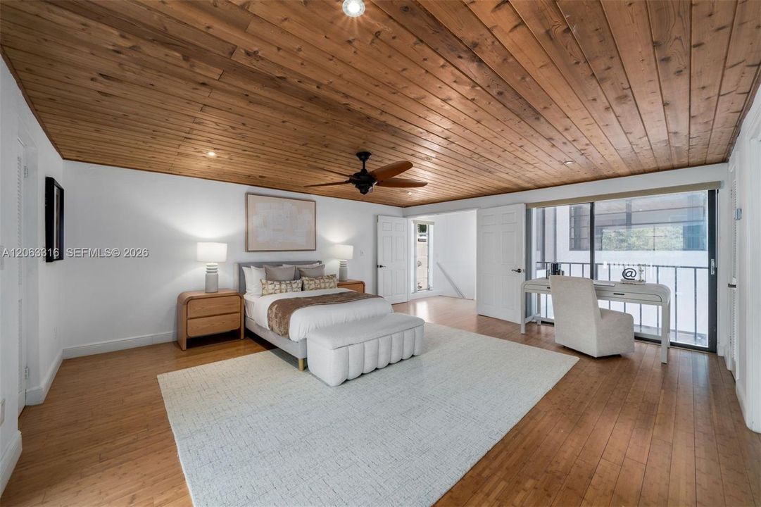 2nd bedroom ensuite with private balcony overlooking 50' private backyard
