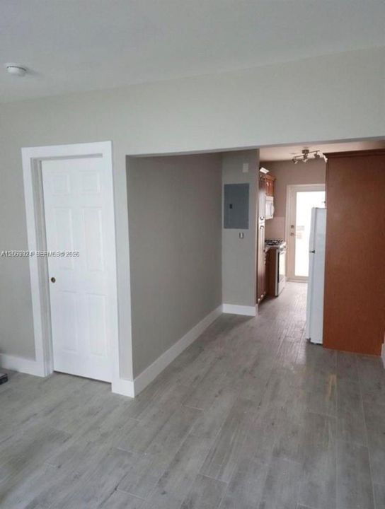 bedroom entrance and kitchen