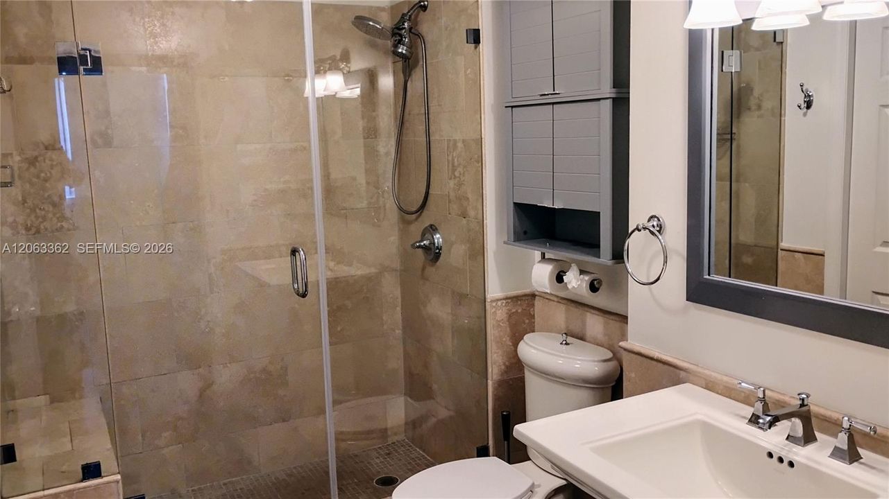 Spacious bathroom with step-in shower
