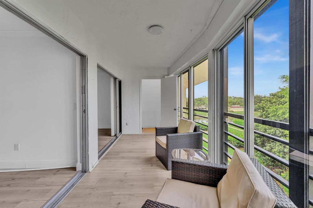 Balcony with screens, glass sliders