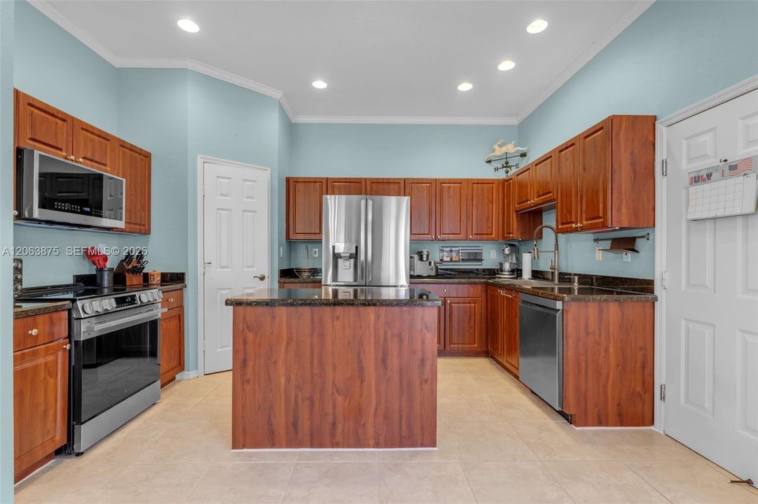Open Concept Kitchen with New Stainless Appliances