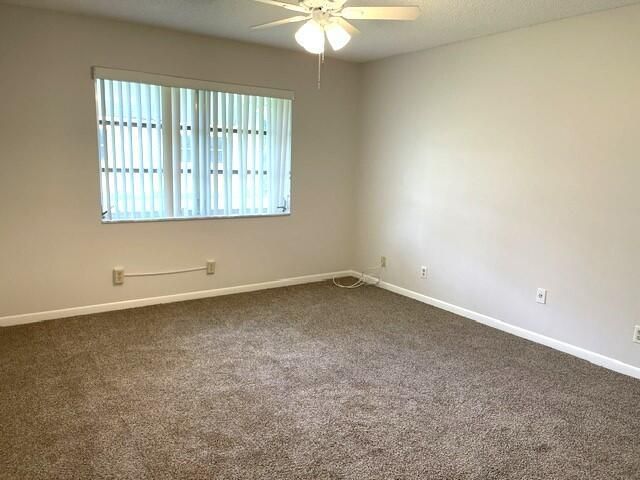 Guest bedroom with new carpet