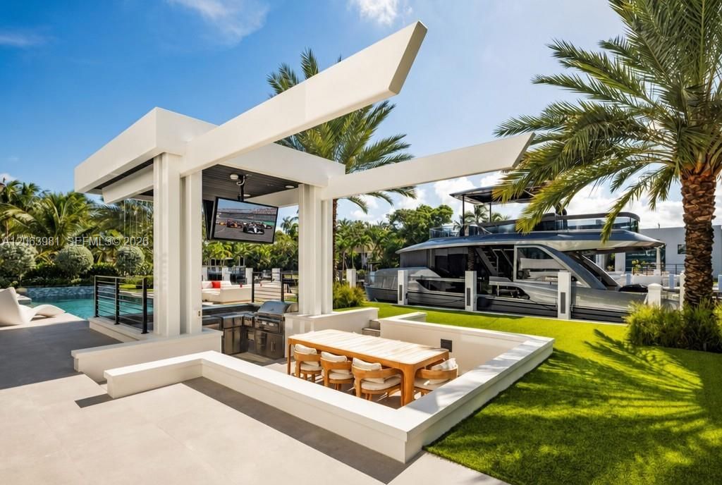 Your own resort: a gazebo, a waterfall, and a swim-up bar.