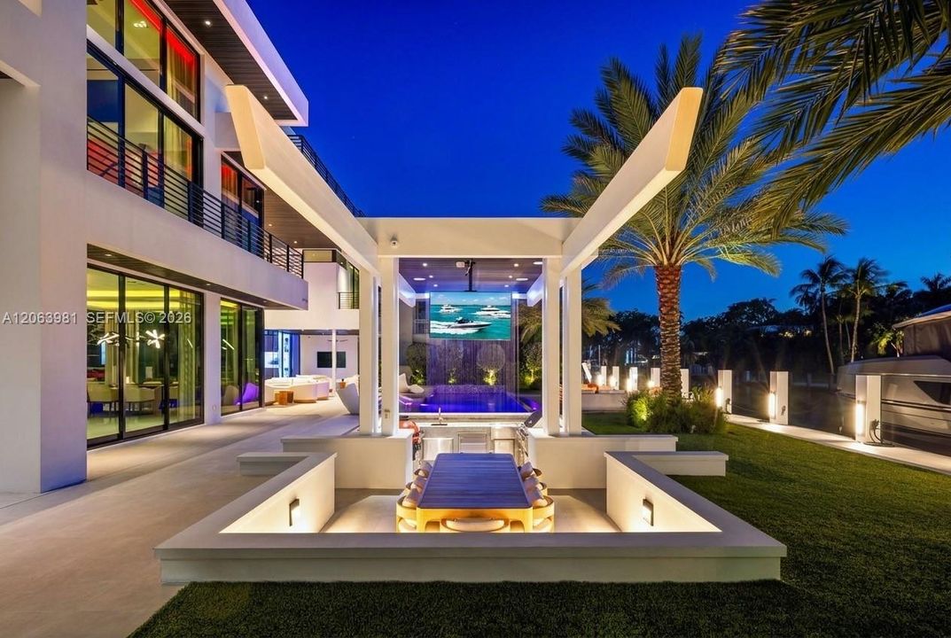 Your own resort: a gazebo, a waterfall, and a swim-up bar.