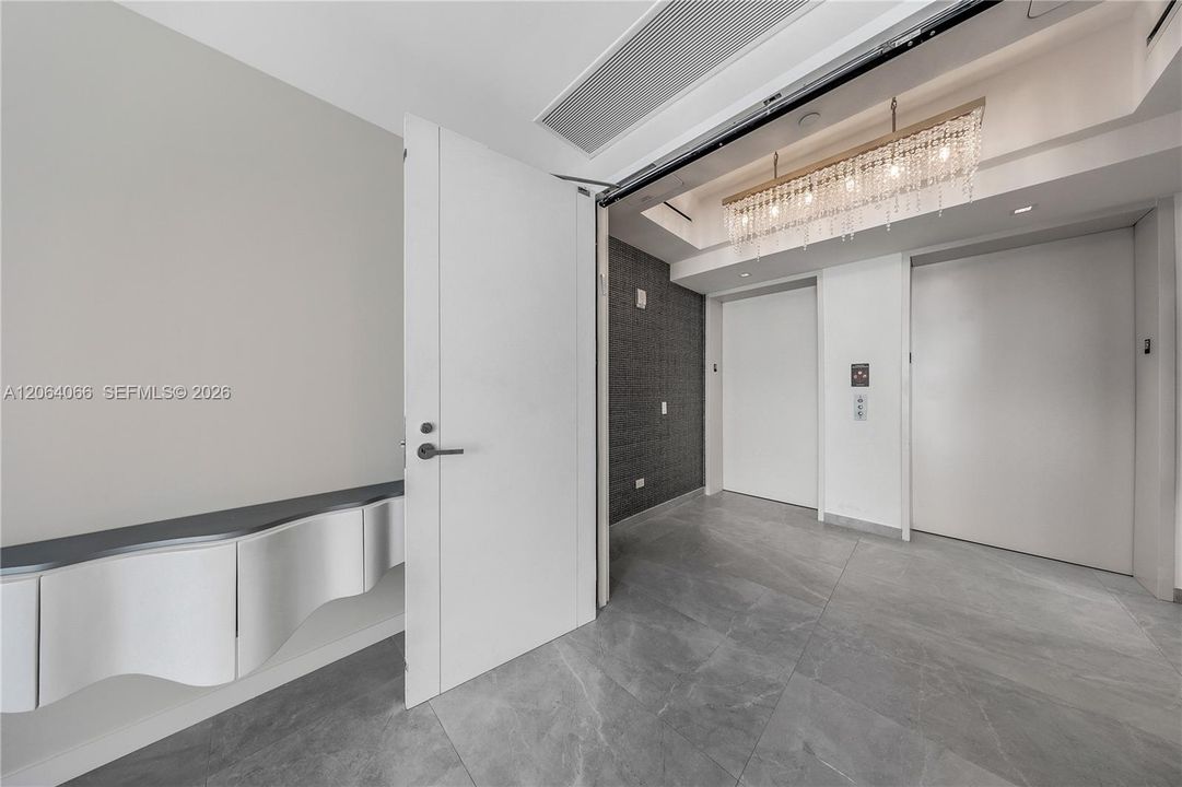 2 Elevators to a private foyer, double doors entrance