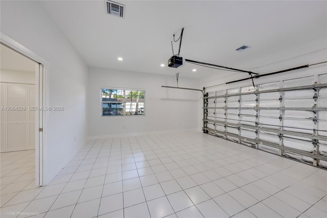 2 cover garage with a room