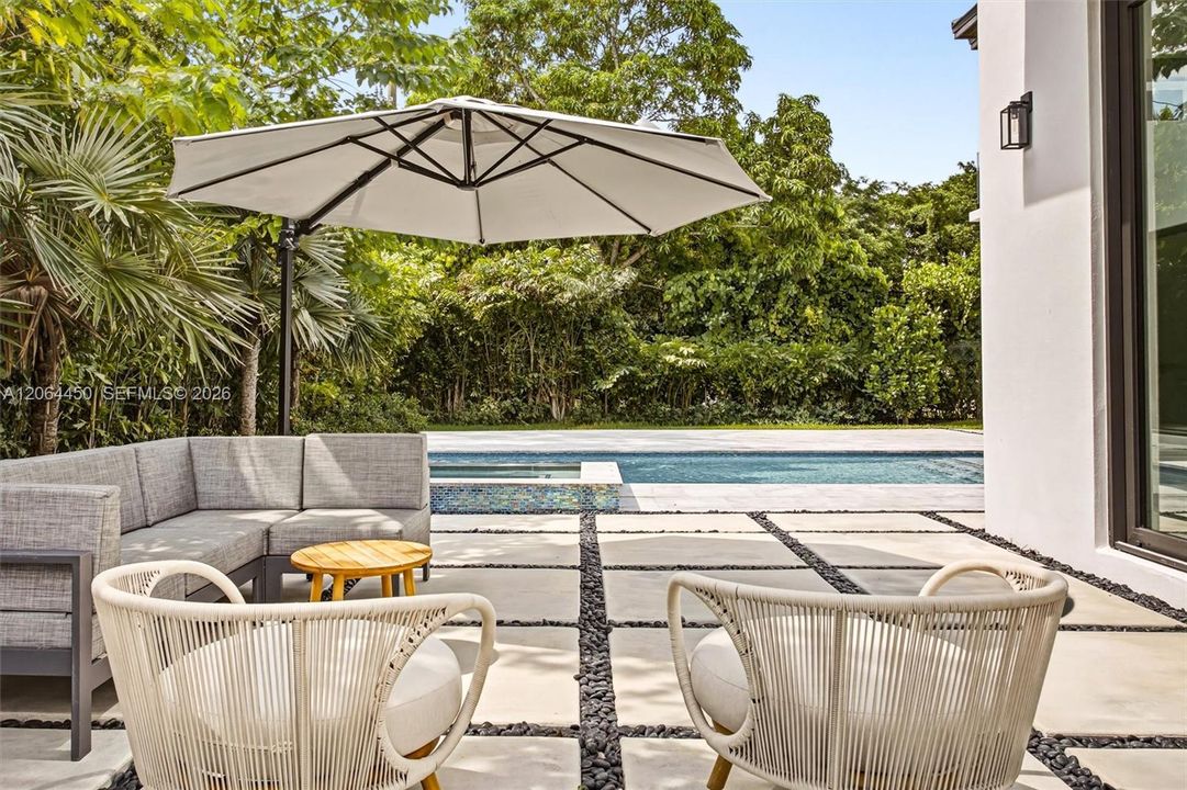 Pool area with covered seating