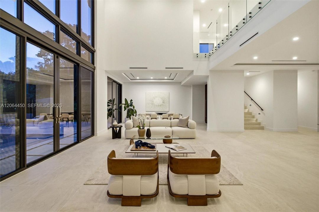 Lobby with dining area and staircase