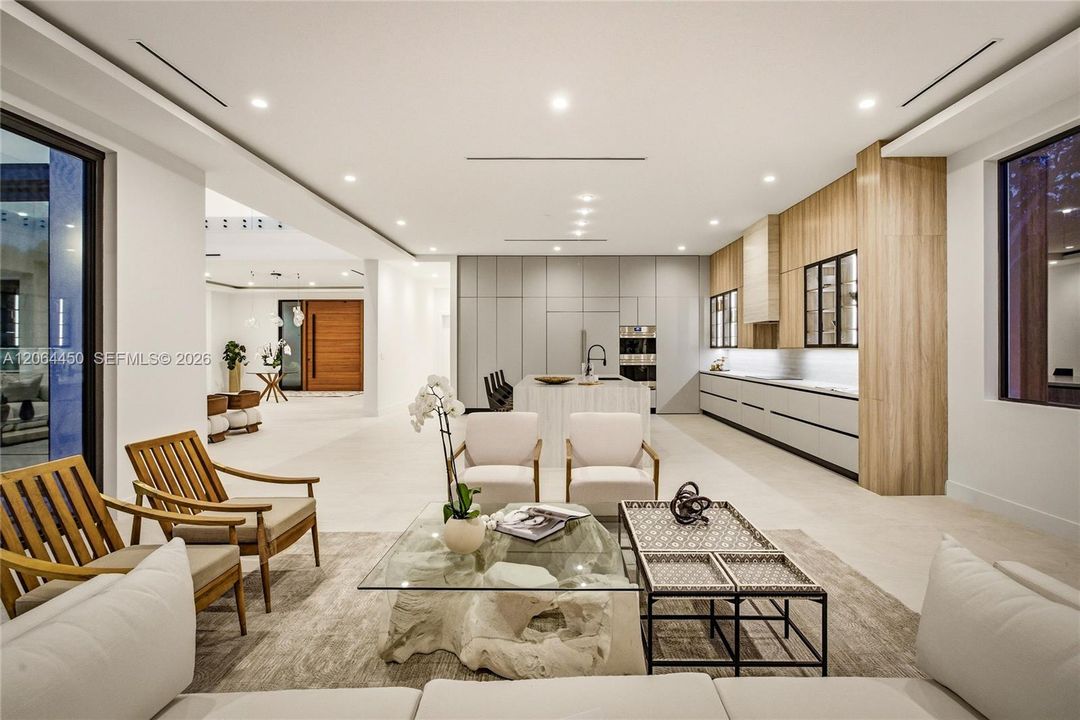 Casual lounge area with kitchen view