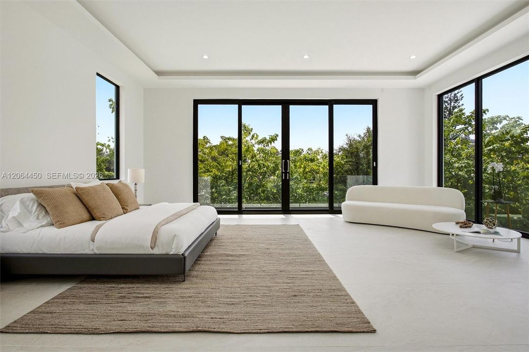 Bedroom with large windows