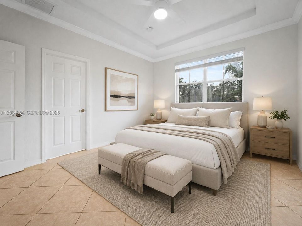 Spacious Master Suite with His/Hers Closets (staged photograph)