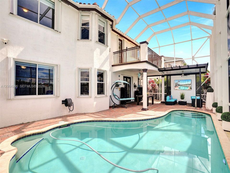 SCREENED POOL WITH COVERED PORCH, GAZEBO WITH LIGHTS, CEILING FAN, TV HOOKUP.  MASTER BEDROOM BALCONY OVERLOOKING POOL AND CORN FIELD FOR BEAUTIFUL SUNSETS.