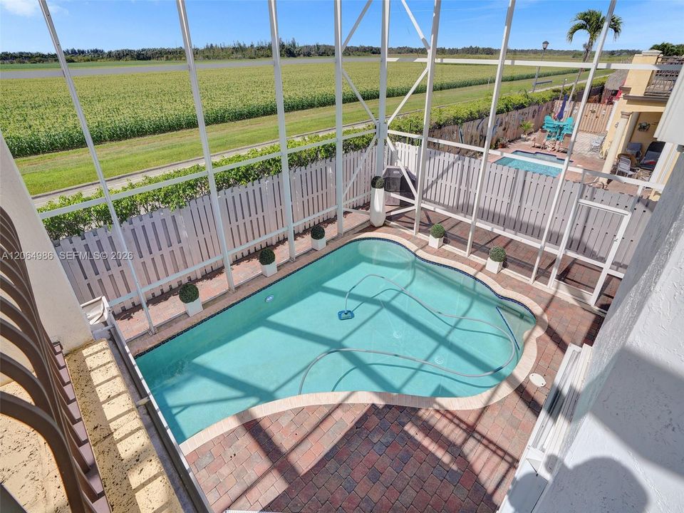 VIEW OF POOL FROM BALCONY