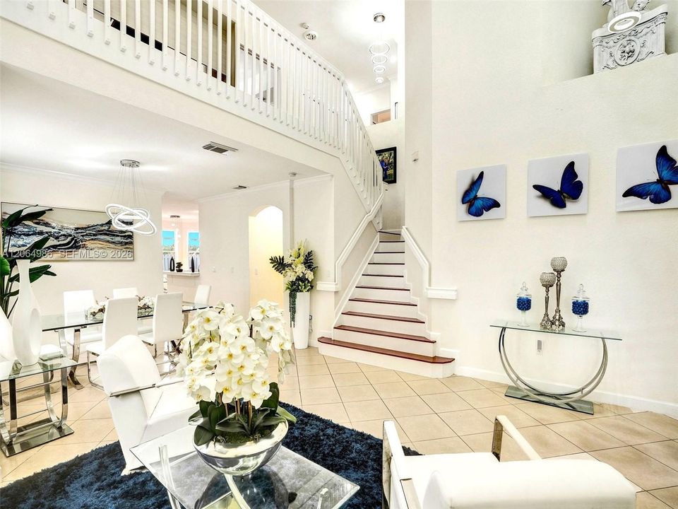 LIVING ROOM WITH VOLUME CEILINGS