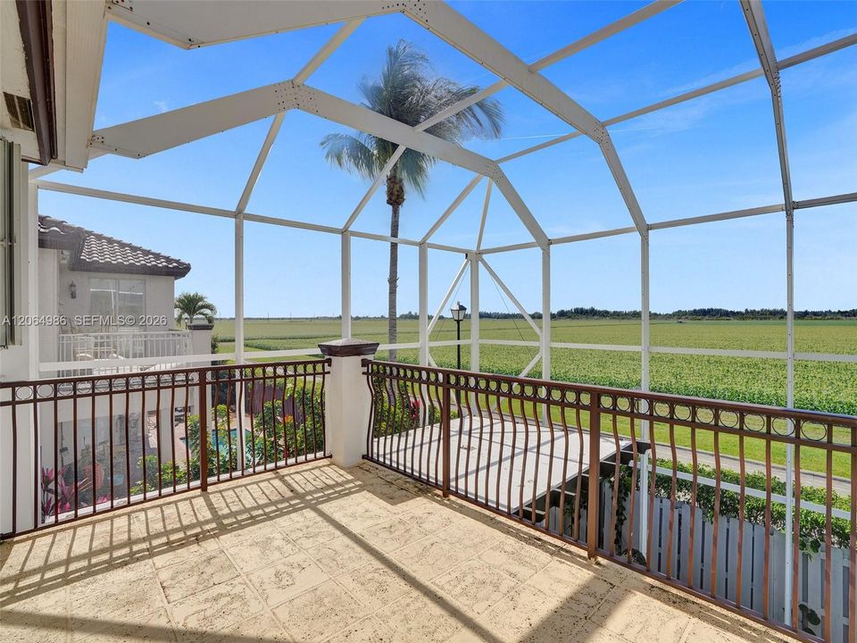 SECOND FLOOR BALCONY VIEWING SOUTH OF THE PROPERTY.