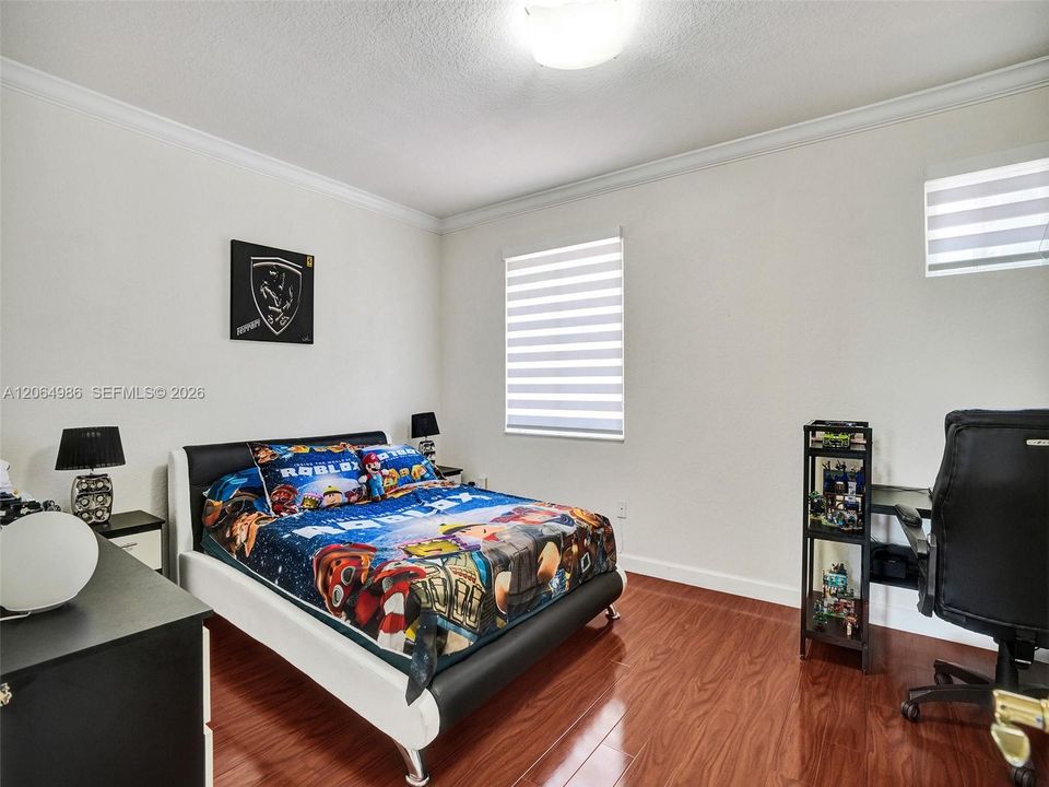ANOTHER VIEW OF LARGE SECOND BEDROOM UPSTAIRS WITH ENOUGH ROOM FOR OFFICE DESK OR SITTING AREA AND WALK-IN CLOSET