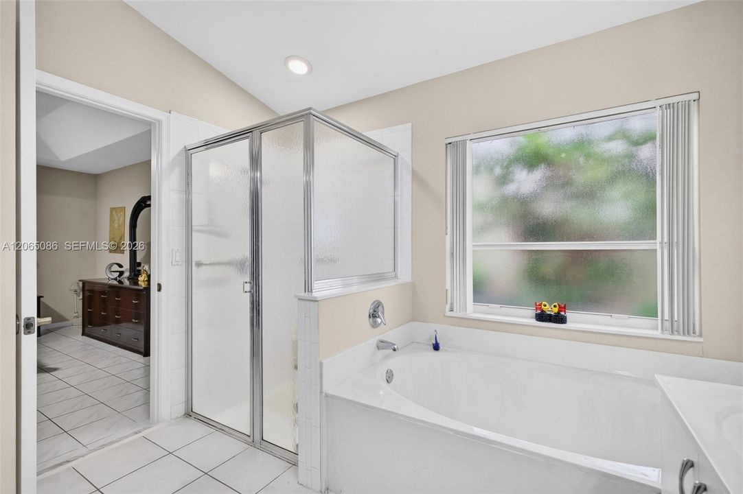 Windowed Primary Bathroom w/ Separate Shower and Tub