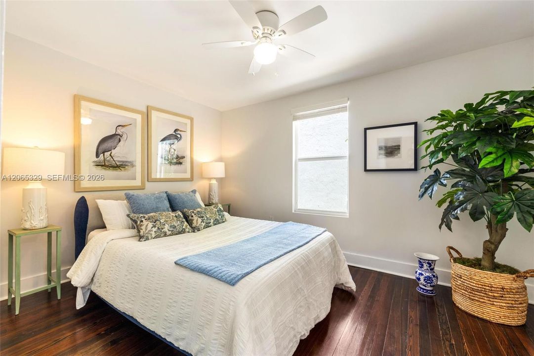 The first bedroom feels quiet from the moment you walk in.
