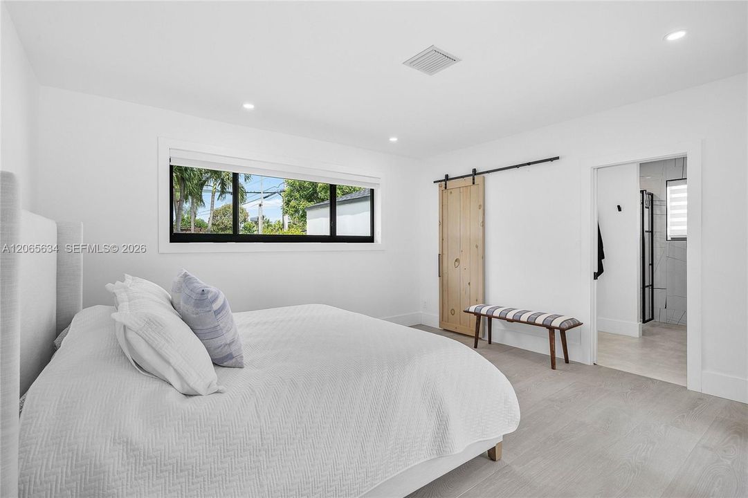 MAIN BEDROOM/ IMPACT WINDOWS/ WALK IN CLOSET