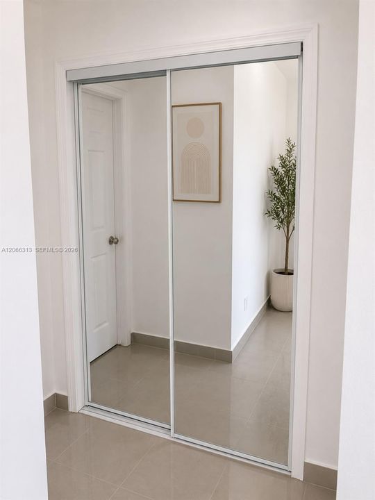 The unit is UNFURNISHED- This photo is VIRTUAL STAGED FOR VISUALIZATION