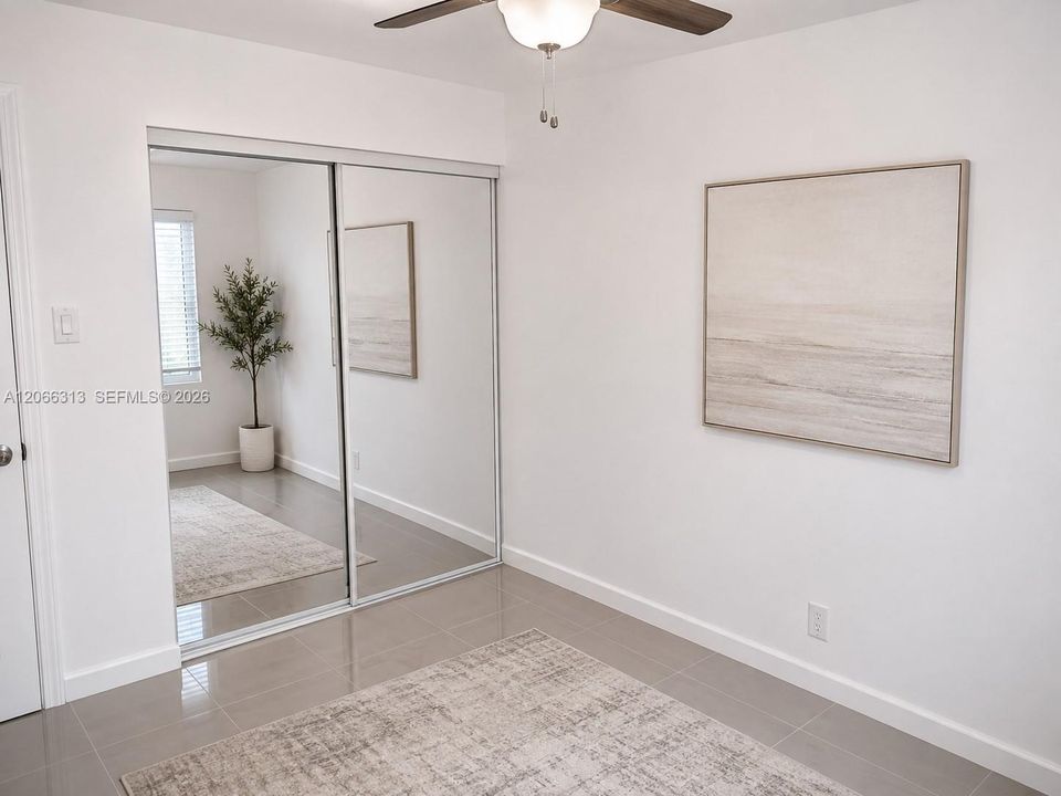 The unit is UNFURNISHED- This photo is VIRTUAL STAGED FOR VISUALIZATION