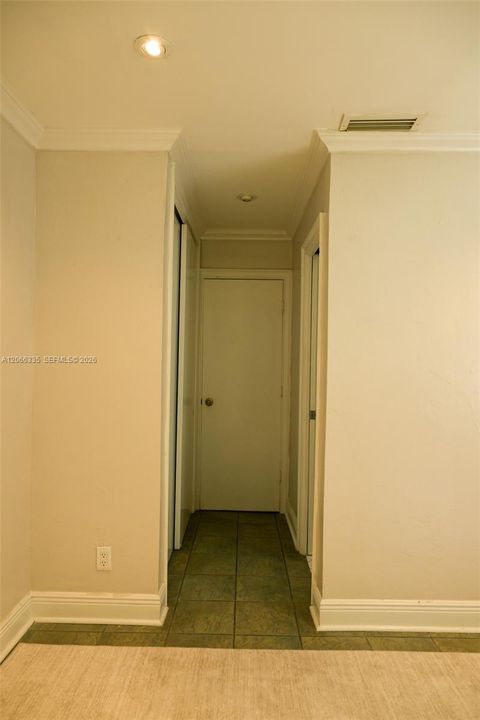THIRD BEDROOM EXIT TO CLOSET AND SECOND BATHROOM