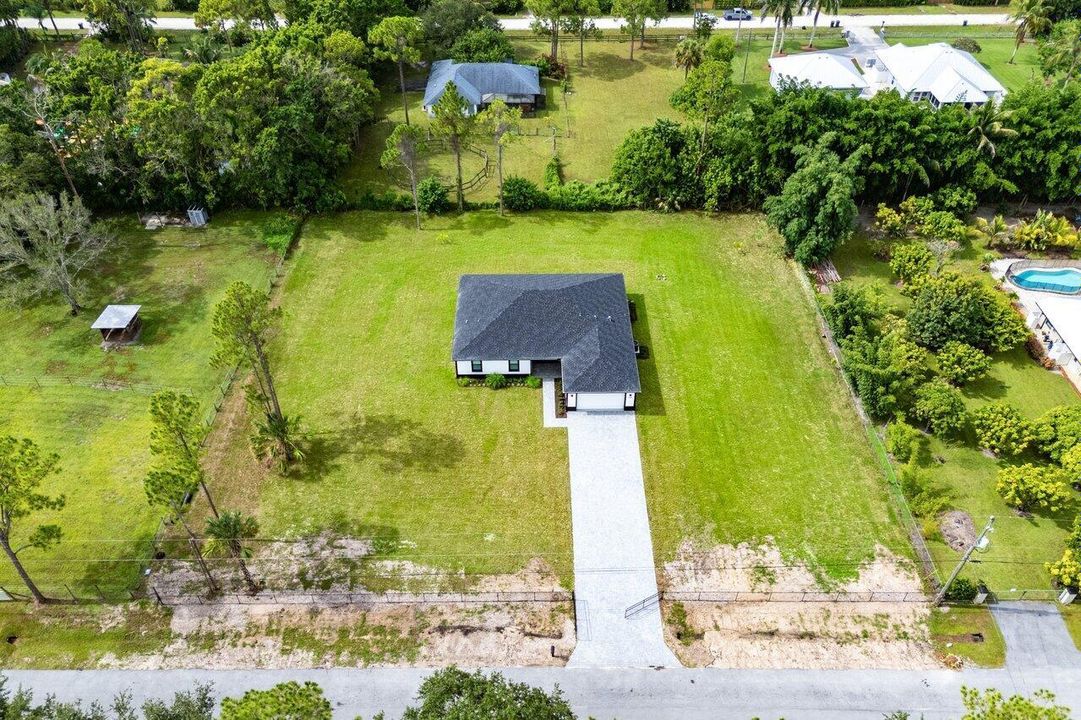037-1482689thPlaceNorth-TheAcreage-FL-33