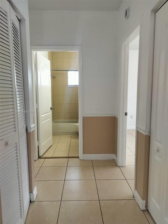 HALLWAY TO BEDROOMS ONE AND TWO