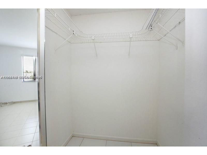 Two walk-in closets in the primary bedroom.